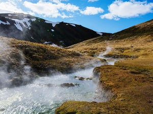 a steaming stream in Reykjadalur Valley
