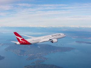 Qantas Dreamliner flying through the sky
