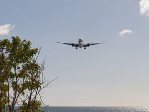 plane landing at Aimé Césaire Airport