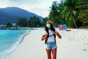 Tourist on empty Thailand beach