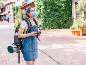 tourist Young woman wearing medical mask