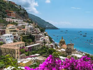 Scenic view of sea by buildings against sky,Amalfi,Salerno,Italy