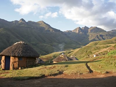 Traditional rondavel huts in the Lesotho mountains