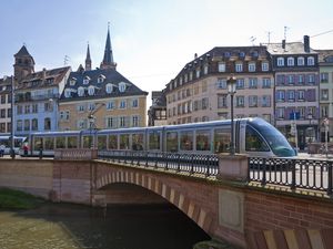 A tram runs over a bridge in Strasbourg, France