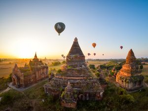 Fish eye view of Hot Air Ballons over acient temples in the beautiful morning, Old Bagan, Burma, Myanmar