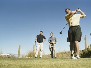 men golfing at Phoenix golf course
