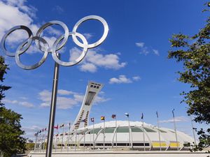 Canada, Quebec province, Montreal, Olympic Park, the Olympic rings and the stadium dating from the Summer Olympics 1976