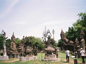 Tourists visiting Wat Xieng Khuan