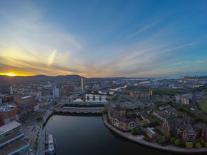 Sunset over Belfast and river