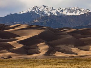 Scenic view of snowcapped mountains against sky,Great Sand Dunes National Park,Colorado,United States,USA