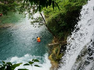High Angle View Of Man Jumping In River