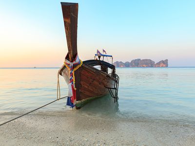 Longtail boat on beautiful beach of South Thailand
