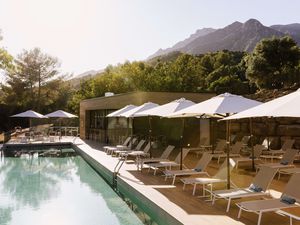 View of Zen Pool with mountain behind it at Club Med Marbella