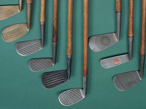 Right to left: waffle face; mesh ball face; Spalding Crowfly Waterfall; McGregor backspin mashie; Wilsonian mashie; Spalding Crowflight; McGill medal mashie niblick; Diamond mid-iron, combined brick face and deep groove.