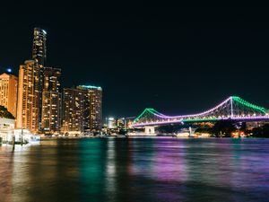 Brisbane skyline and bridge lit up at night