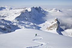 Off-piste skier in powder snow