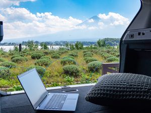 remote working in the car at the foot of mount Fuji
