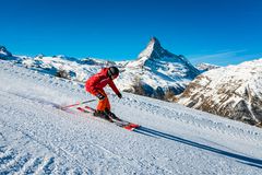 Skier in Zermatt, with the Matterhorn in the background
