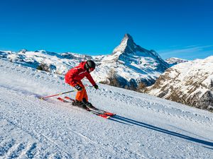 Skier in Zermatt, with the Matterhorn in the background