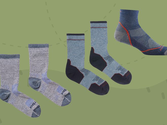 Hiking Socks arranged on a green patterned background
