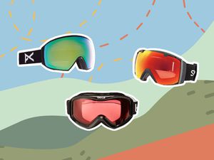 Assortment of ski goggles we recommend outlined in white and displayed on a colorful background