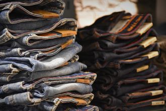 Piles of jeans for sale