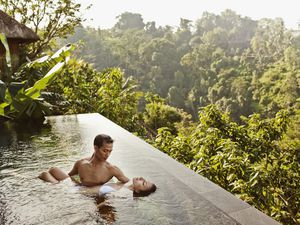 Wellness tourism, tourists in infinity pool
